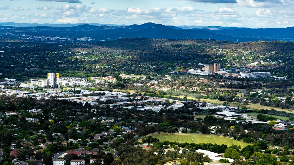 Coalition ties migration cap to homes completed