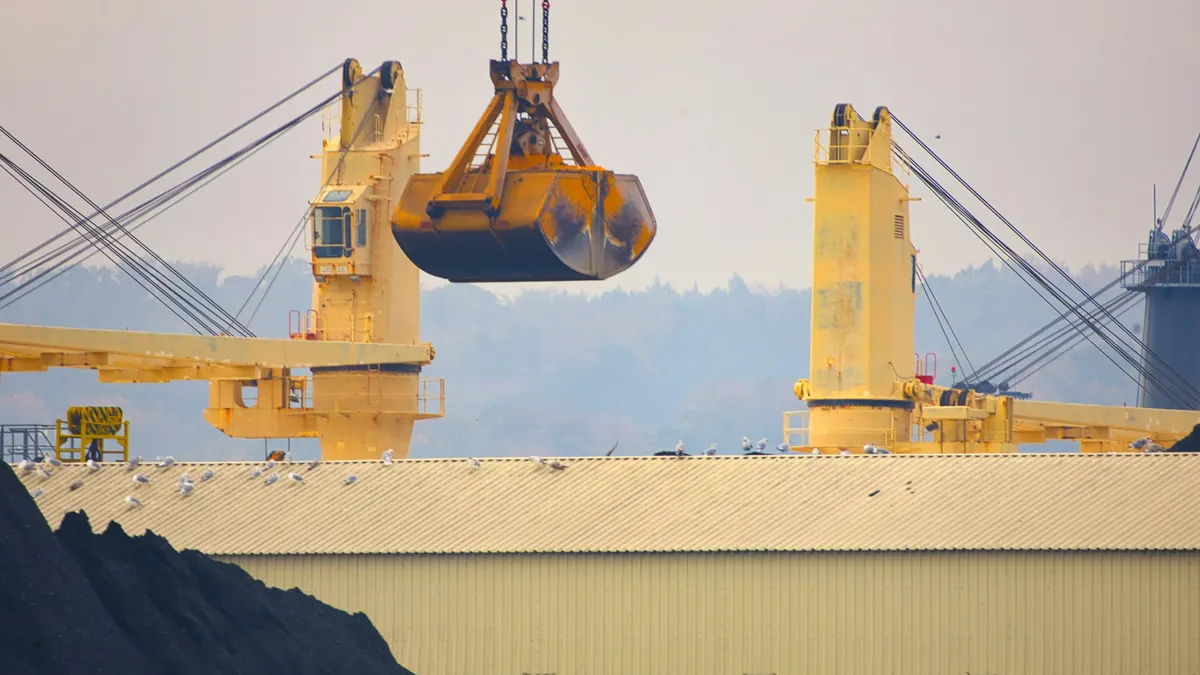 Trade goes into deficit as exports drop