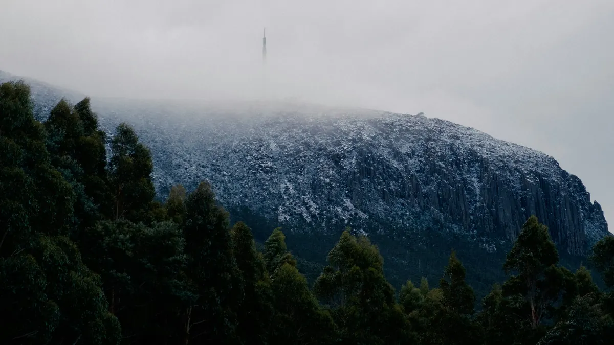 Tasmania gusts hit 128km/h as wind warning narrows